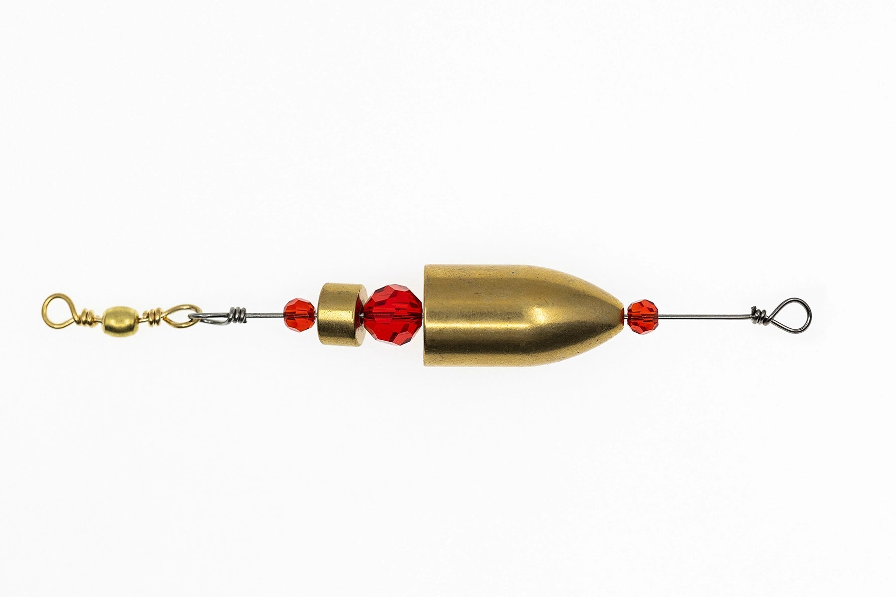 Gold and red fishing lure on a white background