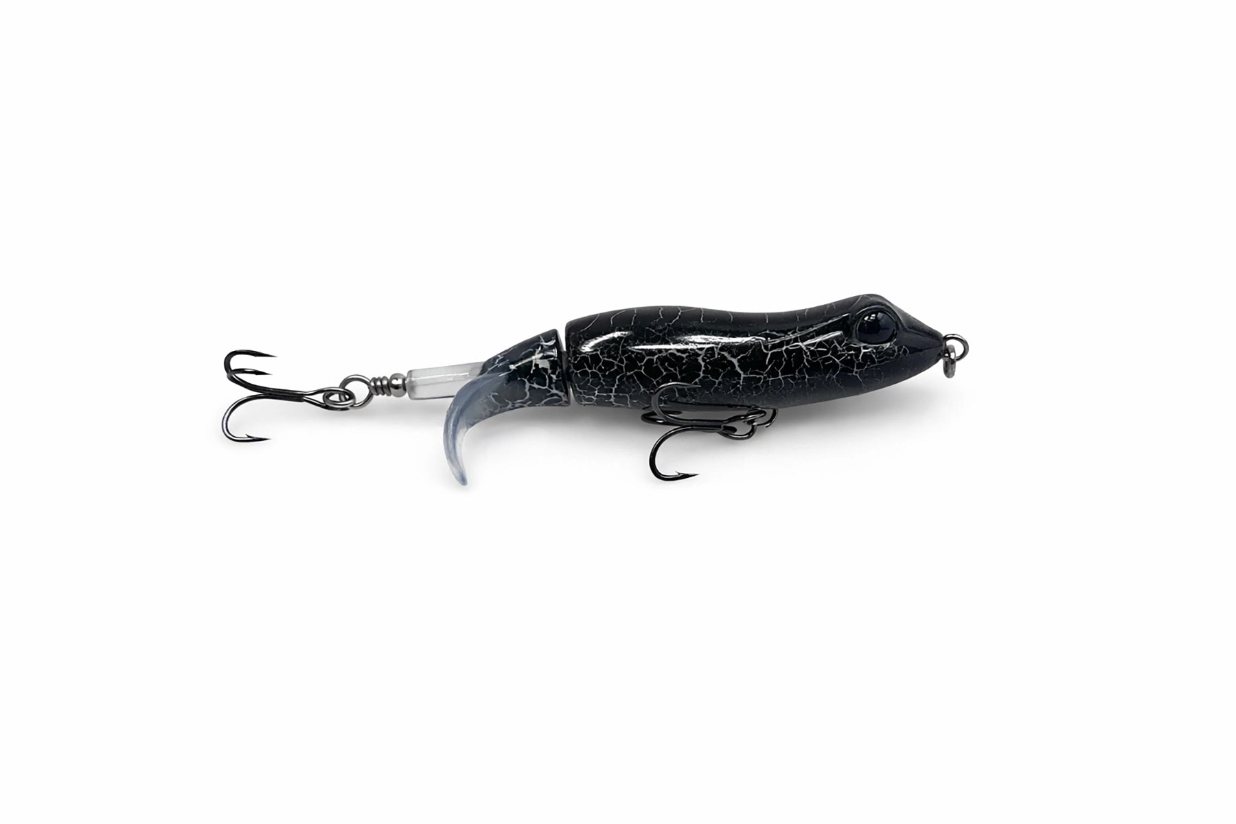 Fishing lure with a cracked pattern on a white background