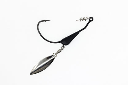 Fishing lure with a metal blade and black skirt on a white background